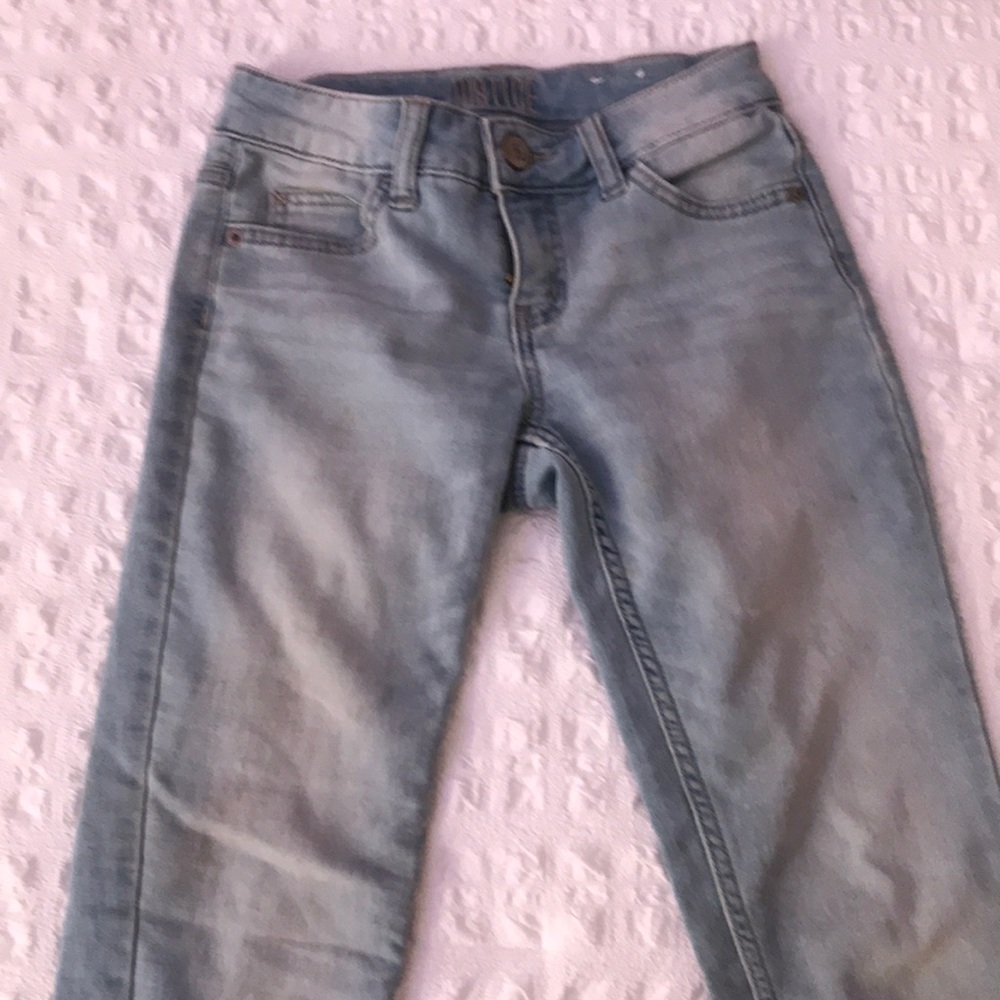 justice light jeans, mid rise super skinny.